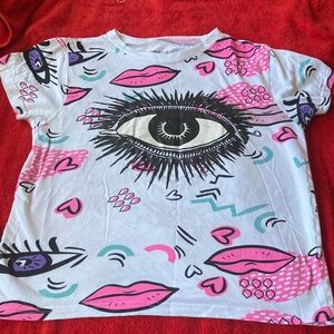 Women’s T-shirt with lips and eyes designs on it size L